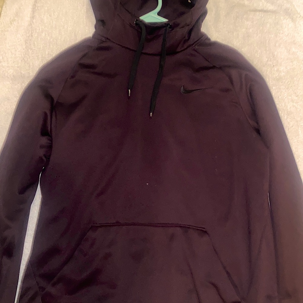 Its a nike dri-fit hoodie its burgundy